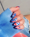 <p>Join in on the most playful trend of the summer by splashing red, white, and blue polish onto your nails for a pop of color. </p><p><em>Watch the <a href="https://www.youtube.com/watch?v=o1dQ2T8CzNU" rel="nofollow noopener" target="_blank" data-ylk="slk:YouTube tutorial;elm:context_link;itc:0;sec:content-canvas" class="link ">YouTube tutorial</a>.</em></p>