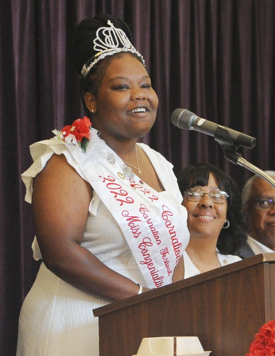 Kayla Martin, the 2022 Greater Alliance Carnation Festival queen, speaks during the Community Luncheon on Saturday, Aug. 6, 2022, at Hoover-Price Campus Center at University of Mount Union.