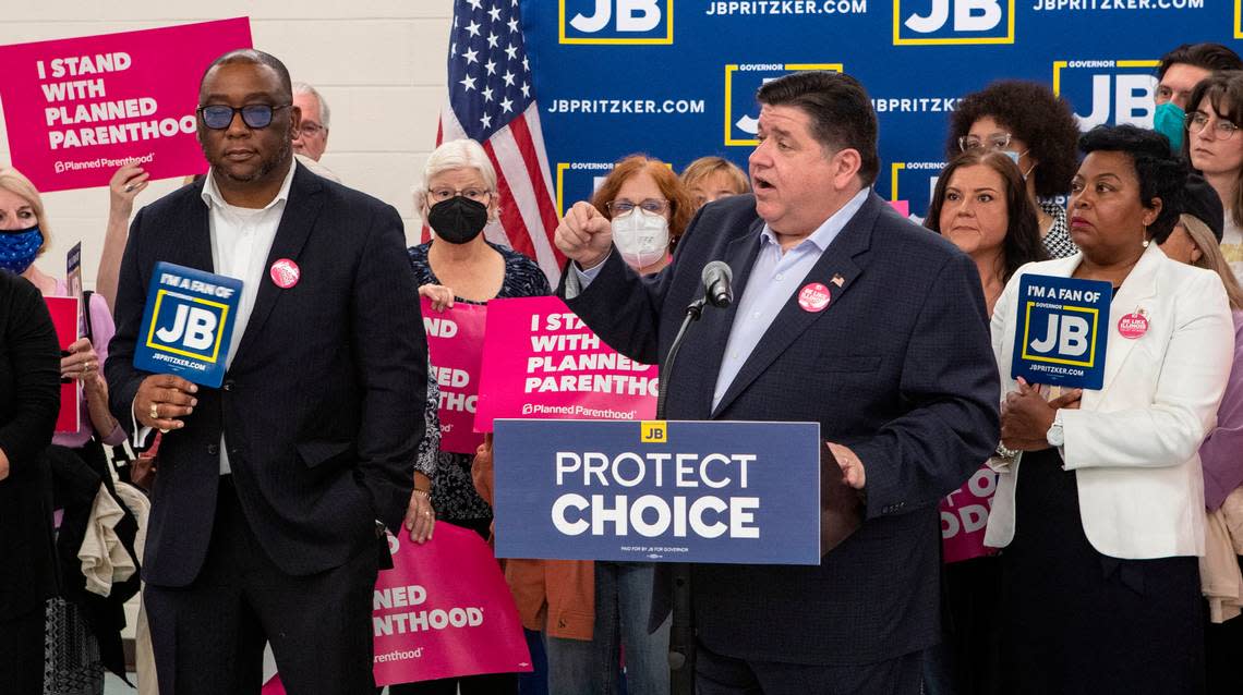 Illinois Gov. J.B. Pritzker is joined by Democratic legislators, abortion rights advocates and other supporters at a pro-choice rally at the Ironworkers Local 396 office in East St. Louis. Pritzker, Senate President Don Harmon and House Speaker Emanuel “Chris” Welch issued a joint statement Tuesday saying the planned special session to respond to the overturning of Roe vs. Wade has been postponed, possibly until the fall.