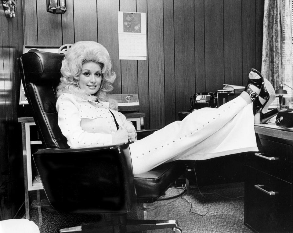 Dolly Parton relaxes in her office on 18th Avenue South in Nashville during an interview on Oct. 5, 1974.