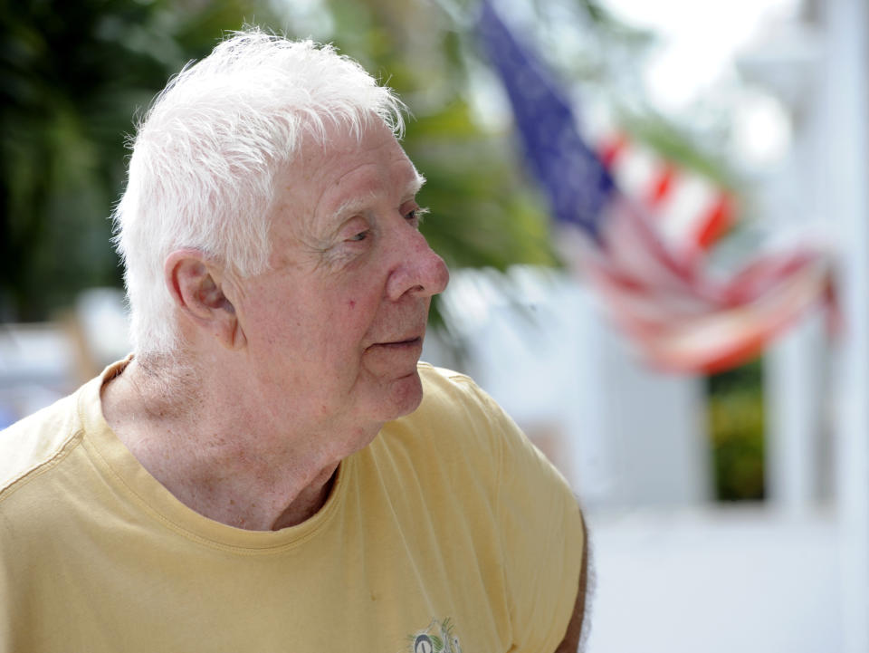 Chuck Wagner, whose home was badly damaged by Hurricane Ian, is shown outside the residence in Fort Myers, Fla., Sunday, Oct. 9, 2022. Southwest Florida is getting some advice from the Florida Panhandle, which was struck by Hurricane Michael in 2018, as it moves ahead following Ian. (AP Photo/Jay Reeves)