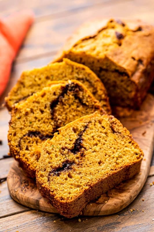 <p>Julie's Eats and Treats</p><p>Tender, delicious homemade pumpkin bread with zucchini. It’s your favorite fall quick bread that’s loaded with zucchini and has a cinnamon swirl in the middle! </p><p><strong>Get the recipe: <em><a href="https://www.julieseatsandtreats.com/cinnamon-swirl-zucchini-pumpkin-bread/" rel="nofollow noopener" target="_blank" data-ylk="slk:Pumpkin Zucchini Bread;elm:context_link;itc:0;sec:content-canvas" class="link rapid-noclick-resp">Pumpkin Zucchini Bread</a></em></strong></p>