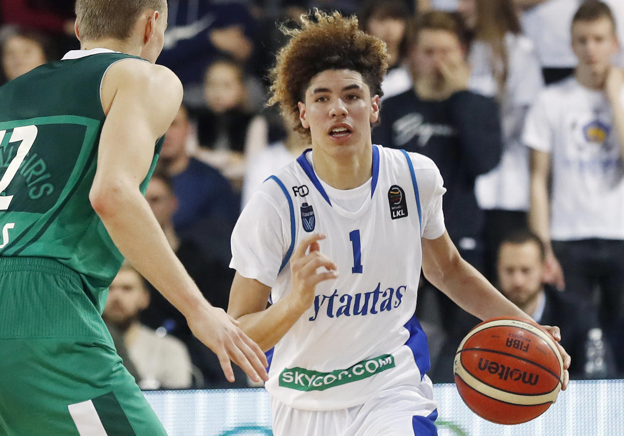 FILE - In this Jan. 9, 2018, file photo, BC Prienu Vytautas's LaMelo Ball is shown in action during the Big Baller Brand Challenge friendly tournament match against BC Zalgiris-2 in Prienai, Lithuania. LaMelo Ball, the brother of Los Angeles Lakers guard Lonzo Ball, has been ejected from a game in Lithuania after striking an opponent. Ball clashed with Lithuanian player Mindaugas Susinskas during Monday's, Oct. 1, 2018, exhibition game between local club Dzukija and a touring team of United States players from the Junior Basketball Association established by the Ball brothers' father, LaVar Ball. (AP Photo/Liusjenas Kulbis, File)