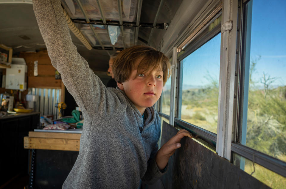 Max looks out at neighboring busses on Feb. 20.<span class="copyright">Nina Riggio for TIME</span>