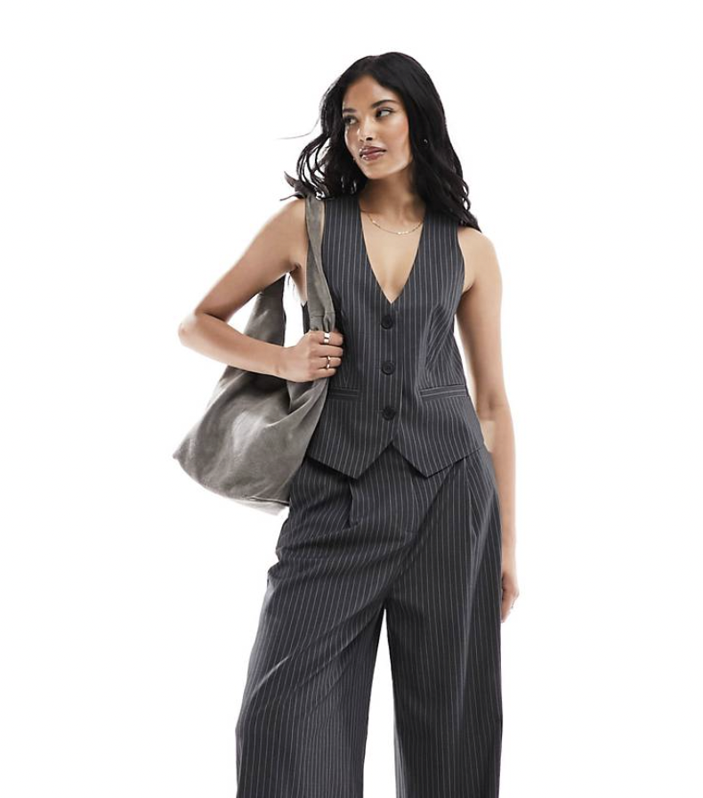 <p><a href="https://go.redirectingat.com?id=74968X1596630&url=https%3A%2F%2Fwww.asos.com%2Fus%2Fasos-design%2Fasos-design-vest-in-gray-pinstripe-part-of-a-set%2Fprd%2F205434926&sref=https%3A%2F%2Fwww.cosmopolitan.com%2Fstyle-beauty%2Ffashion%2Fg42001456%2Fsuit-vests-for-women%2F" rel="nofollow noopener" target="_blank" data-ylk="slk:Shop Now;elm:context_link;itc:0;sec:content-canvas" class="link ">Shop Now</a></p><p>Vest in Gray Pinstripe </p><p>us.asos.com</p><p>$42.99</p>