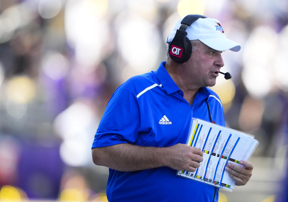 Tulsa head coach Kevin Wilson walks on the sideline during the first half of an NCAA college football game against Washington, Saturday, Sept. 9, 2023, in Seattle. (AP Photo/Lindsey Wasson)
