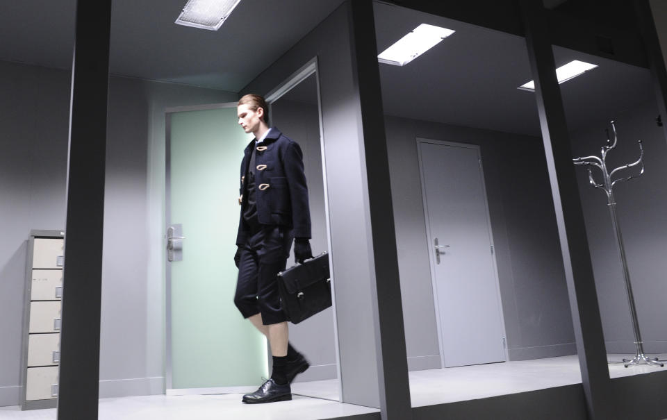 A model wears a creation by French fashion designer Guillaume Henry for Carven's fall-winter 2013/2014 men's fashion collection, presented in Paris, Wednesday, Jan.16, 2013. (AP Photo/Zacharie Scheurer)