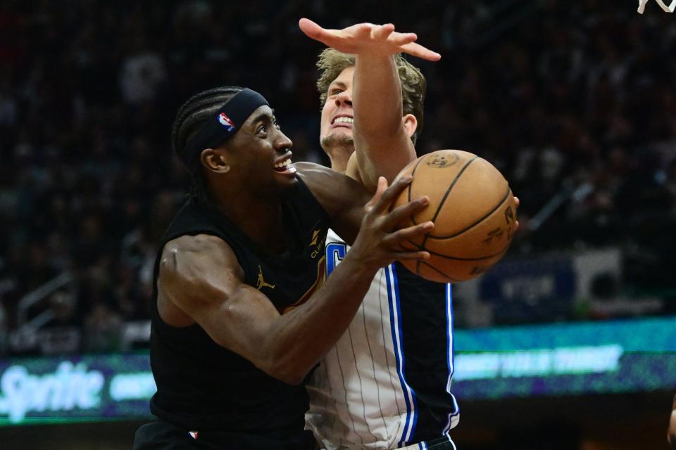 Cavaliers guard Caris LeVert drives to the basket against Magic center Moritz Wagner during the second half in Game 7 of a first-round playoff series, May 5, 2024, in Cleveland.