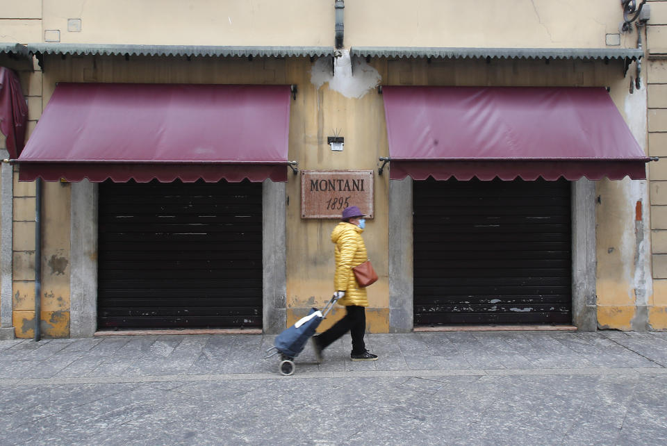 A woman walks in Codogno, Italy, in the Lombardy region. (Antonio Calanni/AP)