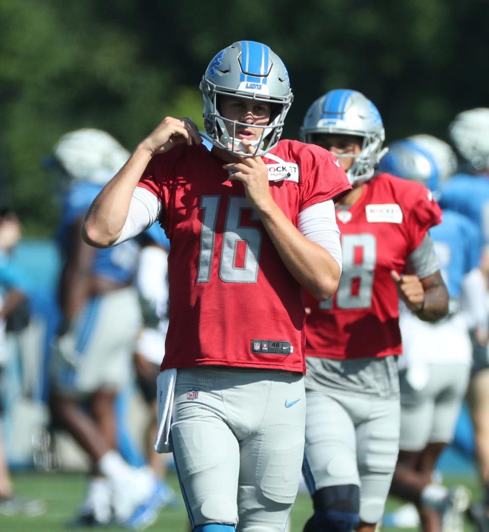 Lions quarterback Jared Goff gets ready for drills during the Lions' joint practice with the Jaguars on Wednesday, Aug. 16, 2023, in Allen Park.