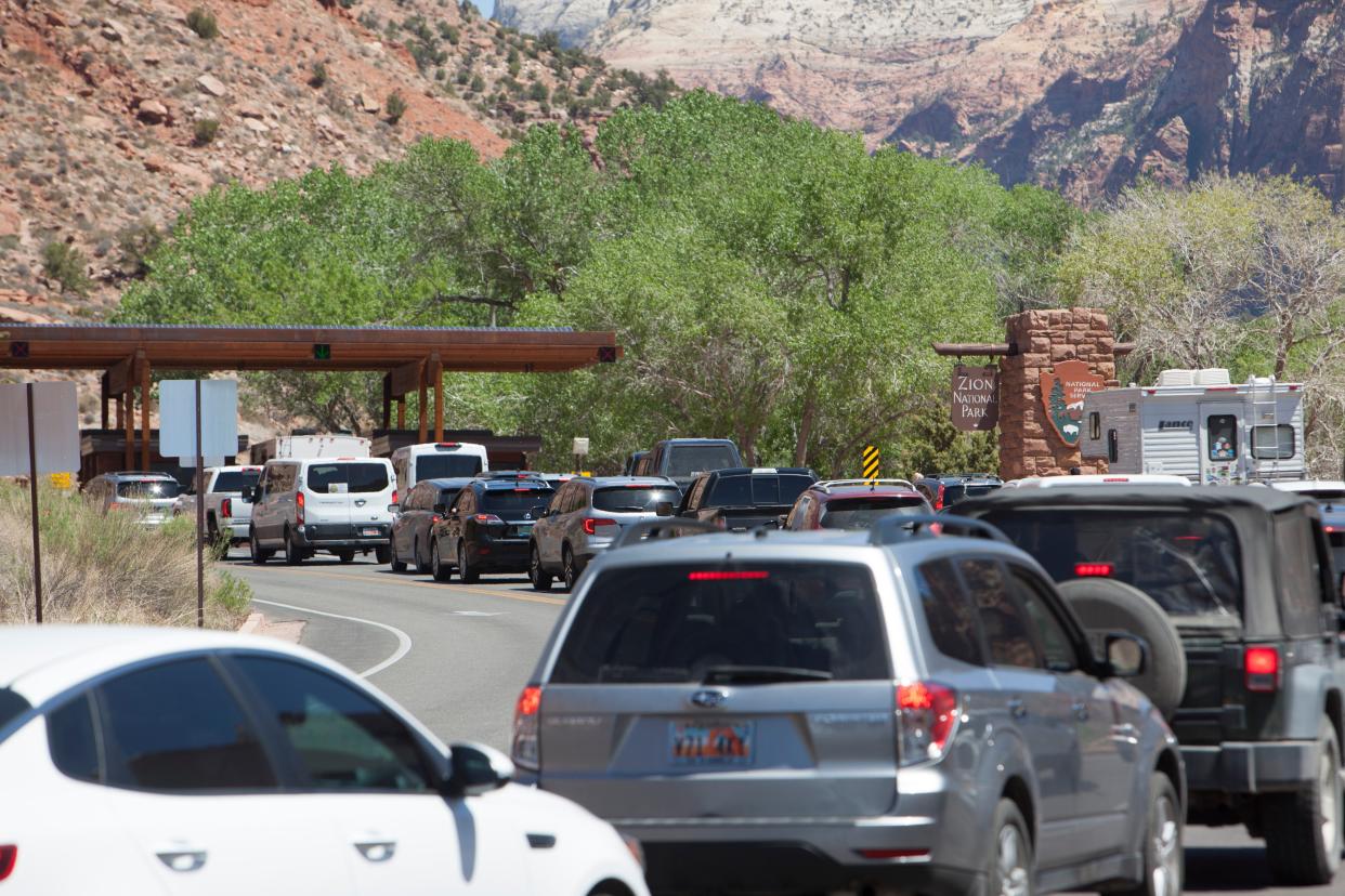 Visitors line up at the entrance to Zion National Park in 2021.