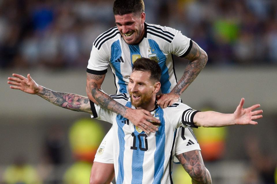 Argentina's Lionel Messi celebrates with teammate Rodrigo De Paul during their international friendly vs. Panama in March. Messi, considered by many to be soccer's greatest player ever, is headed to MLS to play for Inter Miami this summer. It's not likely, though, that Austin FC will get to play against him.