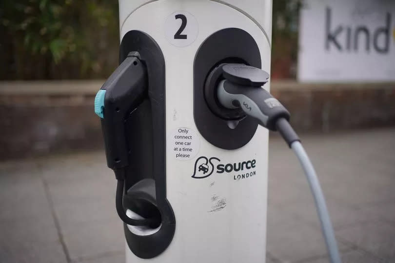 An electric car being charged in a bay in Southwark, London