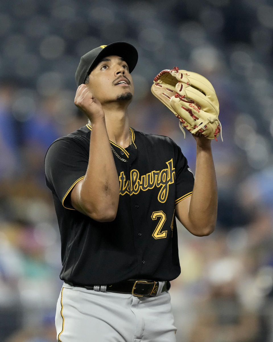 Pittsburgh Pirates starting pitcher Johan Oviedo celebrates after a baseball game against the Kansas City Royals Monday, Aug. 28, 2023, in Kansas City, Mo. Oviedo pitched a complete game leading the Pirates to a 5-0 win. (AP Photo/Charlie Riedel)