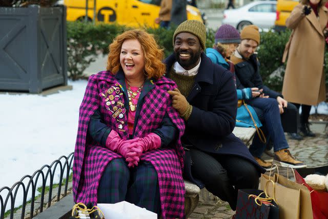 <p>Universal Pictures</p> Melissa McCarthy and Paapa Essiedu in <em>Genie</em> (2023)