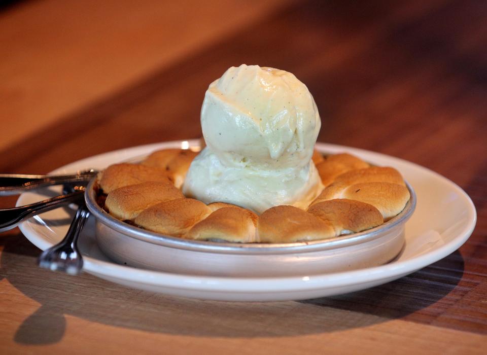 BJ’s Restaurant and Brewhouse’s signature dessert, the Pizookie. This one is the peanut butter s’mores Pizookie, topped with toasted marshmallows and ice cream.