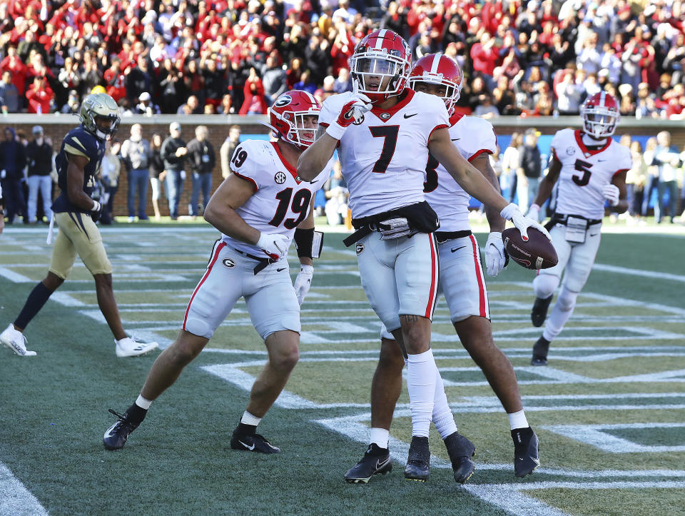 Georgia wide receiver Jermaine Burton celebrates his touchdown reception against Georgia Tech during the first quarter of an NCAA college football game on Saturday, Nov. 27, 2021, in Atlanta. (Curtis Compton/Atlanta Journal-Constitution via AP)