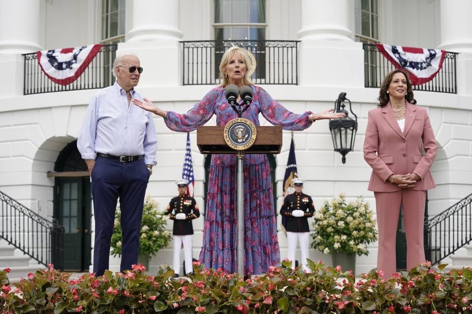 FILE - First lady Jill Biden speaks at the Congressional Picnic on the South Lawn of the White House, July 12, 2022, in Washington. President Joe Biden, left, and Vice President Kamala Harris, right, look on. (AP Photo/Patrick Semansky, File)