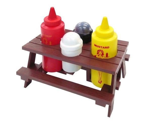 <i><a href="http://www.target.com/p/mr-bar-b-q-picnic-table-condiment-set/-/A-13816480#prodSlot=_1_4" target="_blank">Mr. Bar-B-Q Picnic Table Condiment Set, $10.79</a></i>