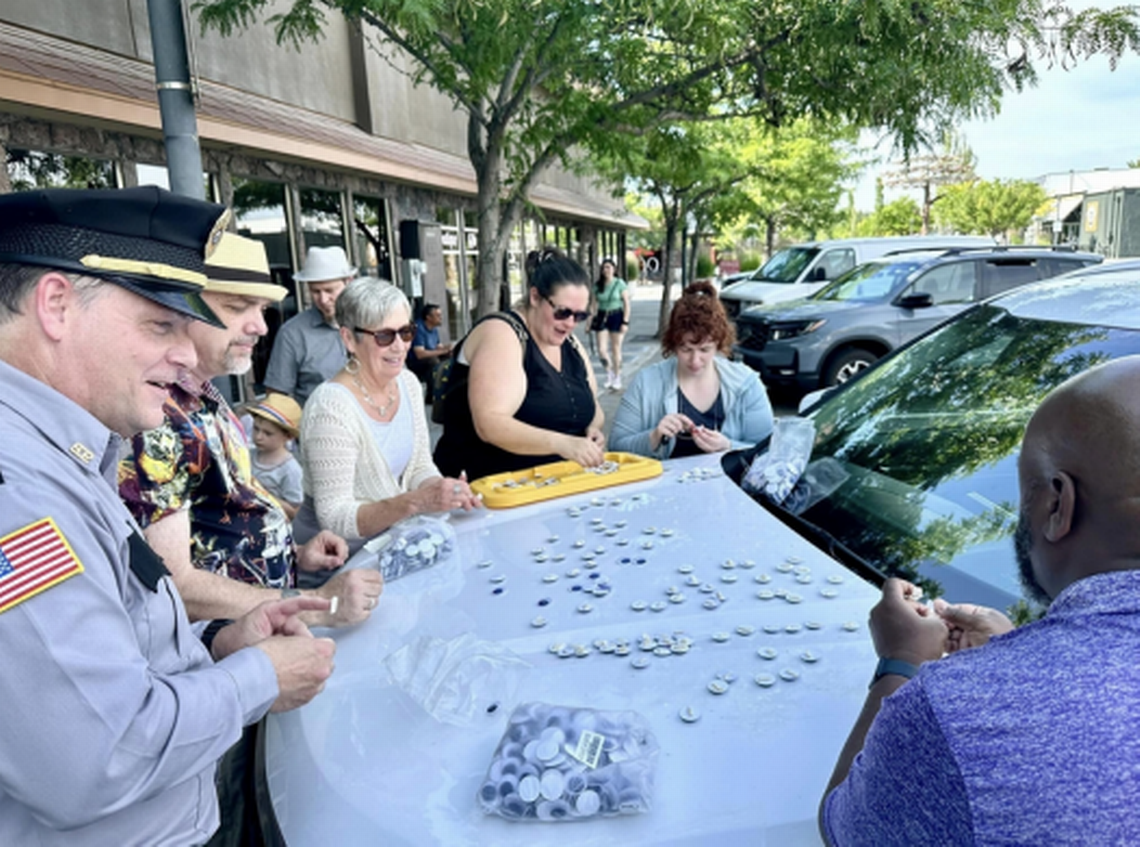 Actors and crew prep googly eyes for a scene recorded in Richland June 9 for the mock-documentary film “Eric Herman and the Invisible Band.”