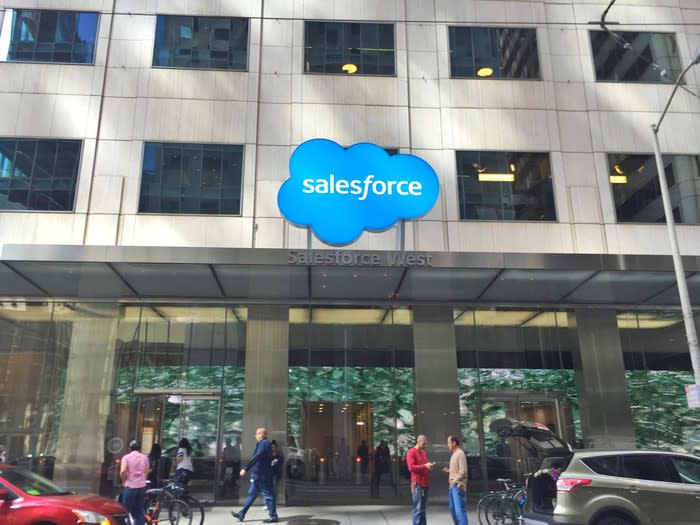 A building entrance with the Salesforce logo above the door.