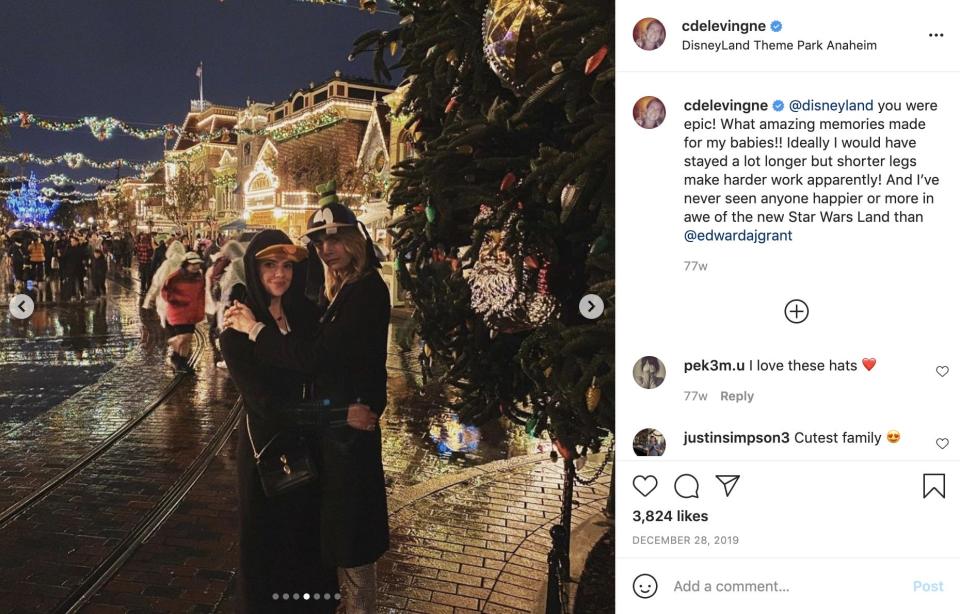 Cara Delevingne and Ashley Benson hug at Disneyland.