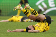 Dortmund players celebrate after the Champions League quarterfinal second leg soccer match between Borussia Dortmund and Atletico Madrid at the Signal-Iduna Park in Dortmund, Germany, Tuesday, April 16, 2024(AP Photo/Martin Meissner)