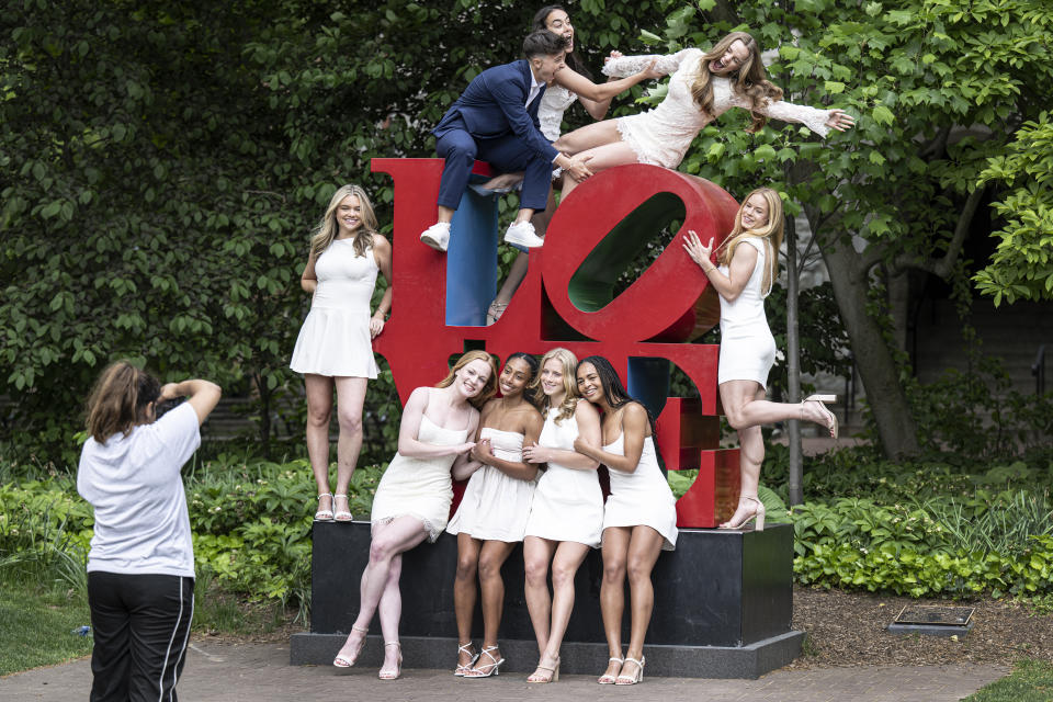 University of Pennsylvania women's NCAA college soccer players pose for a post graduation photo Friday, May 3, 2024, at the Love Statue on the school campus in Philadelphia (Jose F. Moreno/The Philadelphia Inquirer via AP)