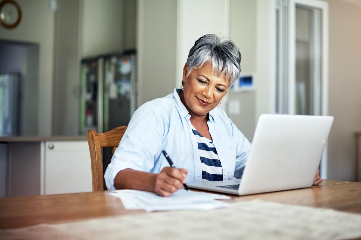 Senior woman working on her laptop