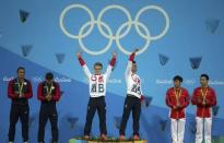 2016 Rio Olympics - Diving - Men's Synchronised 3m Springboard Victory Ceremony - Maria Lenk Aquatics Centre - Rio de Janeiro, Brazil - 10/08/2016. Jack Laugher (GBR) and Chris Mears (GBR) of United Kingdom celebrate on the podium next to Sam Dorman (USA) and Michael Hixon (USA) of USA, and Cao Yuan (CHN) and Qin Kai (CHN) of China. REUTERS/Pilar Olivares