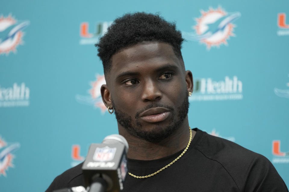 FILE - Miami Dolphins wide receiver Tyreek Hill speaks to reporters after an NFL football game against the Washington Commanders Sunday, Dec. 3, 2023, in Landover, Md. Tyreek Hill is a finalist for The Associated Press 2023 Offensive Player of the Year.(AP Photo/Alex Brandon, File)