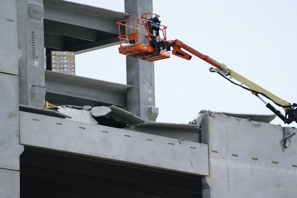 FILE - In this Sept. 11, 2020 photo, damage is seen to a parking deck under construction after it partially collapsed, injuring several workers in Atlanta. The parking deck under construction has collapsed for a second time in as many days. Atlanta Fire Rescue said Saturday, Sept. 12, that fire units were deployed to the building in the city's Midtown section for “a second major collapse” of the parking deck that partially fell Friday. (AP Photo/Elijah Nouvelage, File)