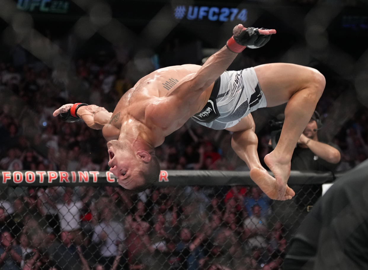 PHOENIX, ARIZONA - MAY 07: Michael Chandler celebrates after his knockout victory over Tony Ferguson in a lightweight fight during the UFC 274 event at Footprint Center on May 07, 2022 in Phoenix, Arizona. (Photo by Jeff Bottari/Zuffa LLC)