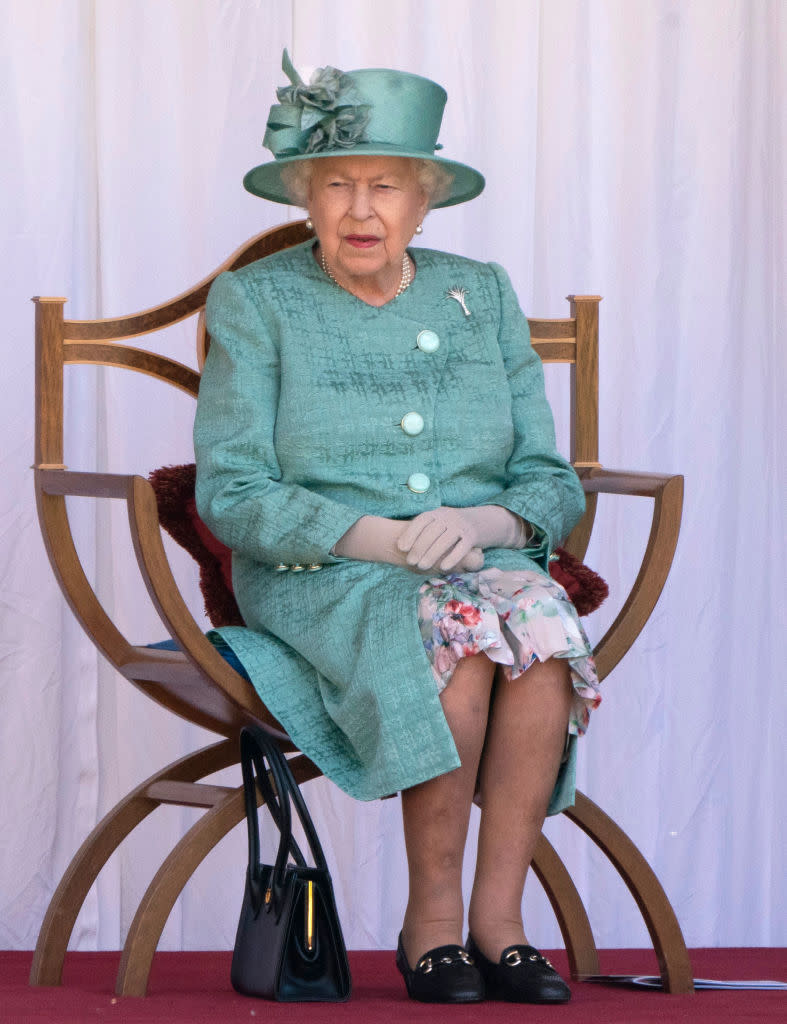 The Queen watches a military ceremony in the Quadrangle of Windsor Castle to mark Her Majesty's Official Birthday on Saturday 13th June, 2020.