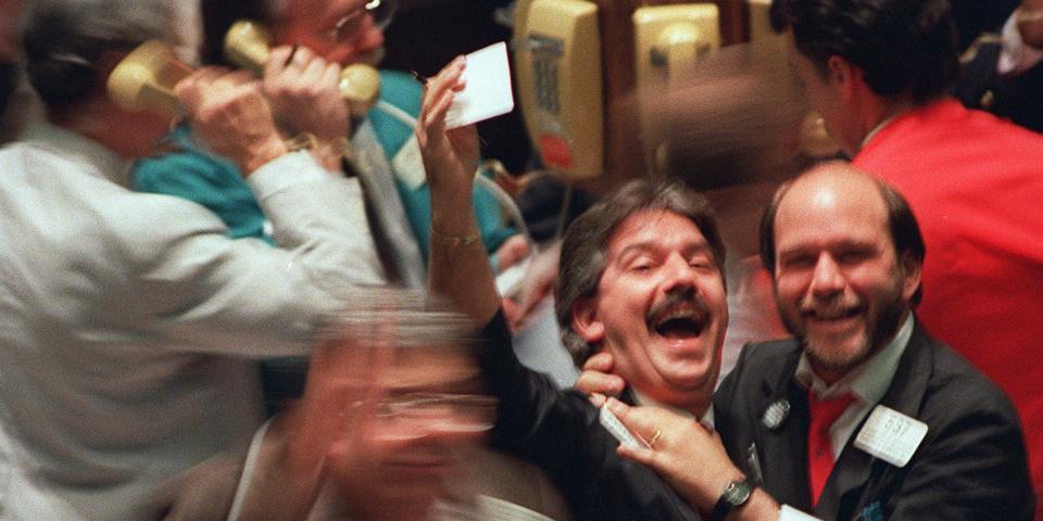 stock traders celebrate in 1999