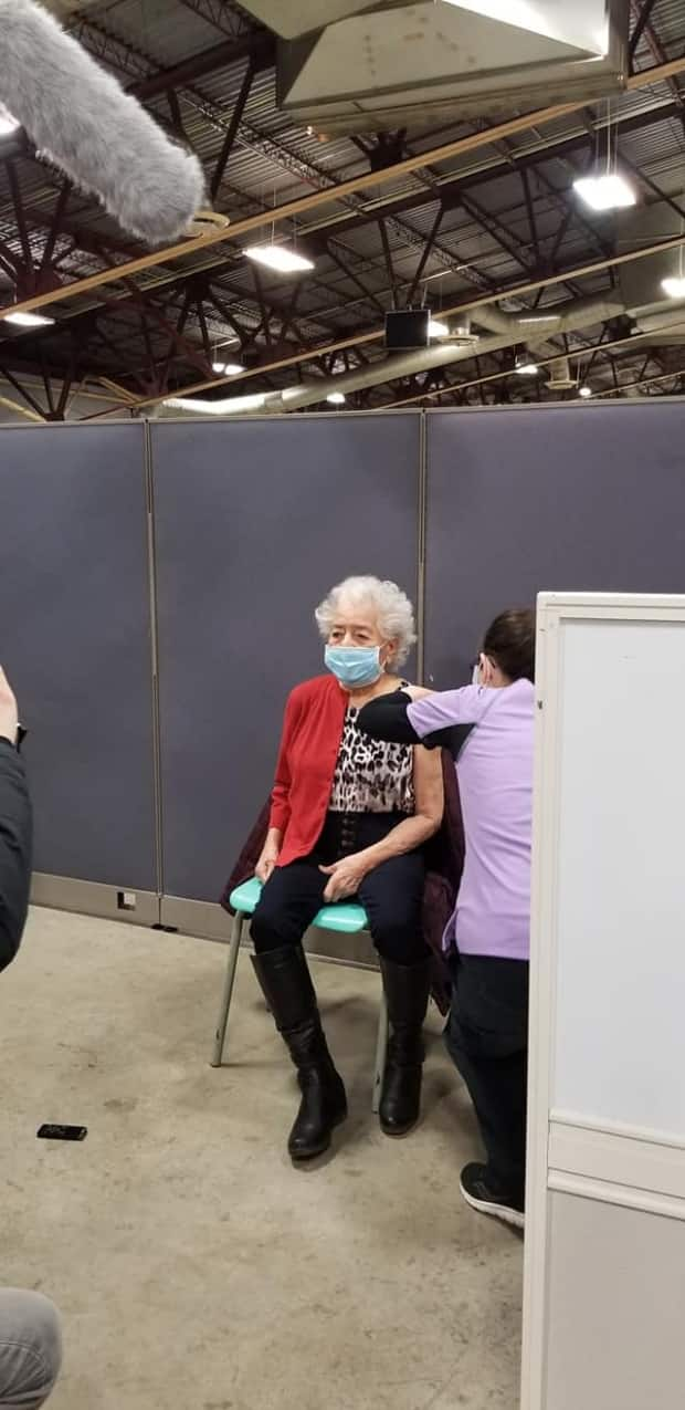 Kahnawake's vaccination clinic opened on March 4, with 90-year-old Warisó:se Myrtle Bush being the first elder to receive the shot. (Submitted by Jenny Kjono - image credit)