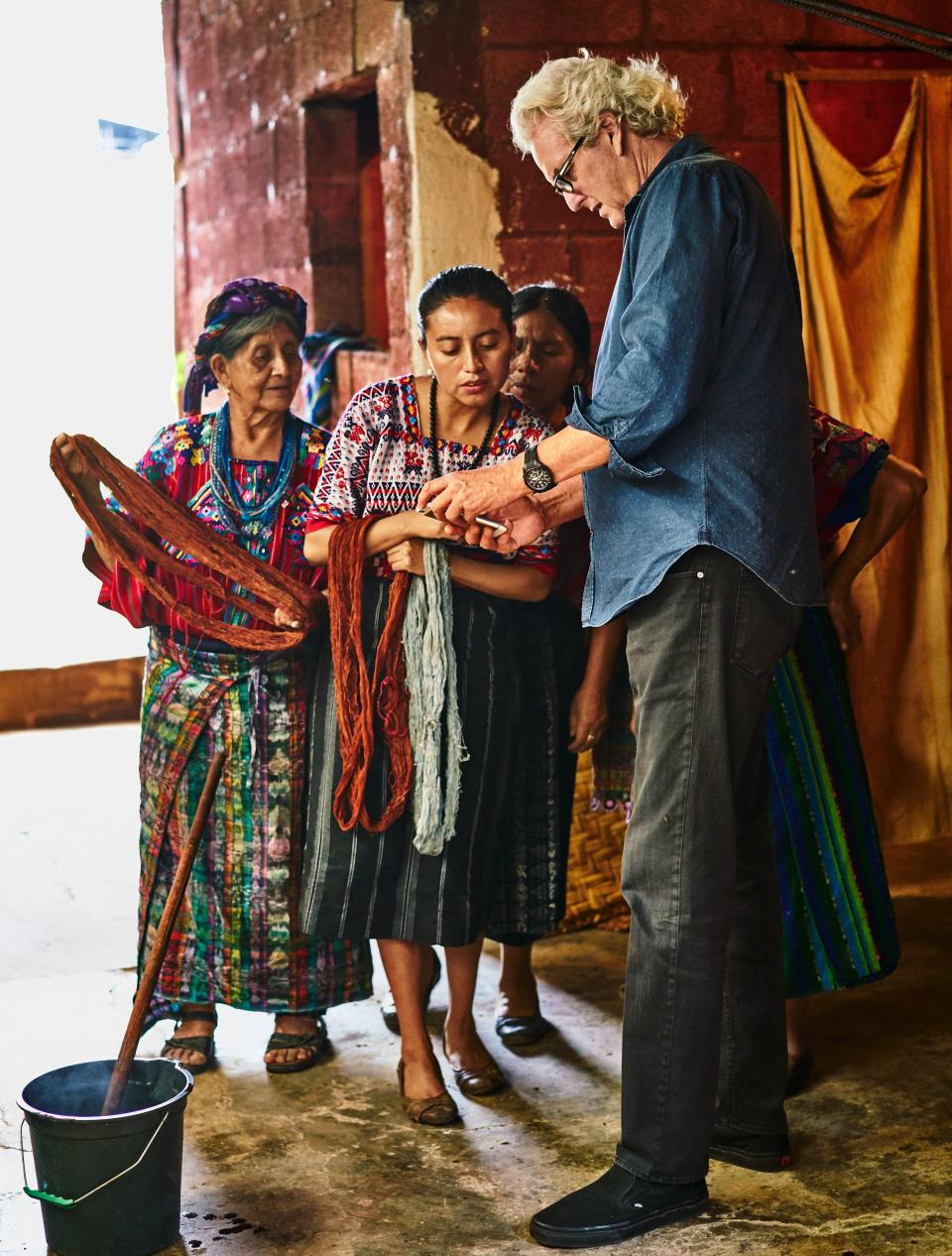 Mitchell Denburg meets with weavers (from left) Octaviana Sente Macajol, Linda Cristal Chile Garcia, and Magna Garcia Chile.