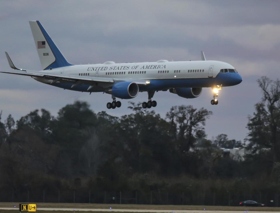 Air Force One arrives at Jacksonville International Airport on Saturday, Jan. 7, 2017, in Jacksonville, Fla. (AP Photo/Gary McCullough)