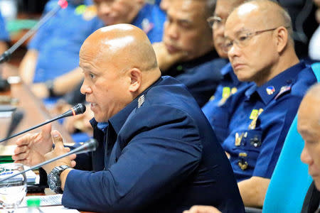 Philippine National Police (PNP) chief Ronald Bato Dela Rosa, answers questions during a hearing on the killing of 17-year-old high school student Kian Delos Santos during a recent police raid, at the Senate headquarters in Pasay city, metro Manila, Philippines August 24, 2017. REUTERS/Romeo Ranoco