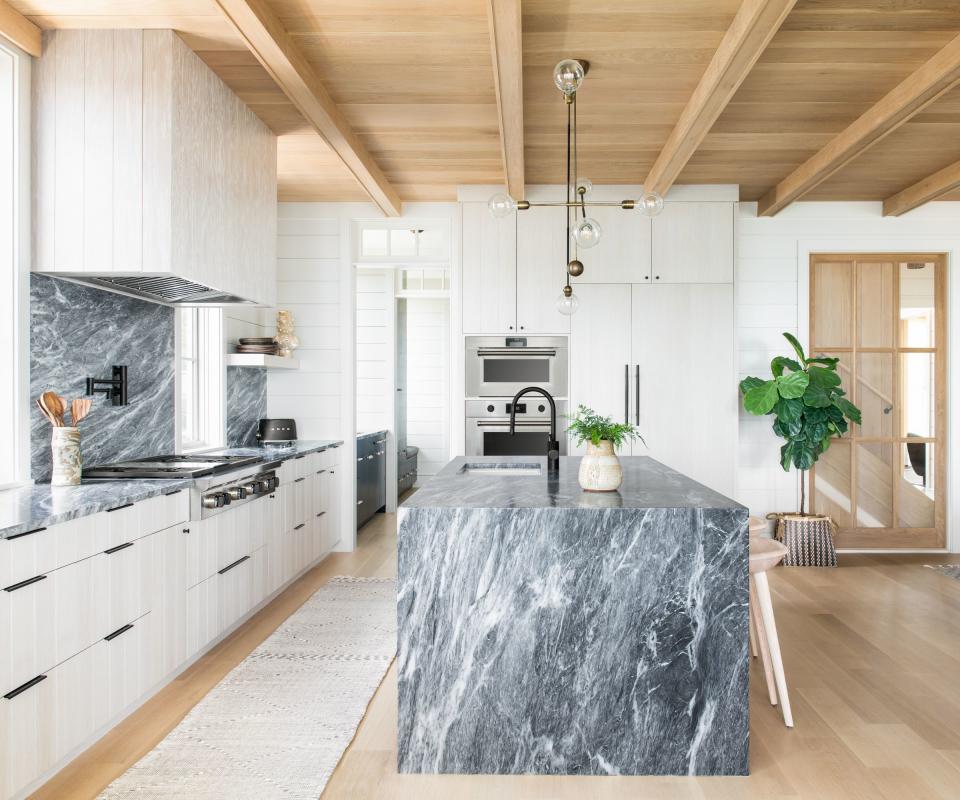 Kitchen with gray marble kitchen island