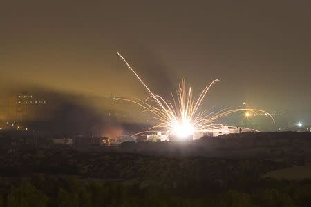 An Israeli rocket is fired into the northern Gaza Strip July 17, 2014. REUTERS/Amir Cohen