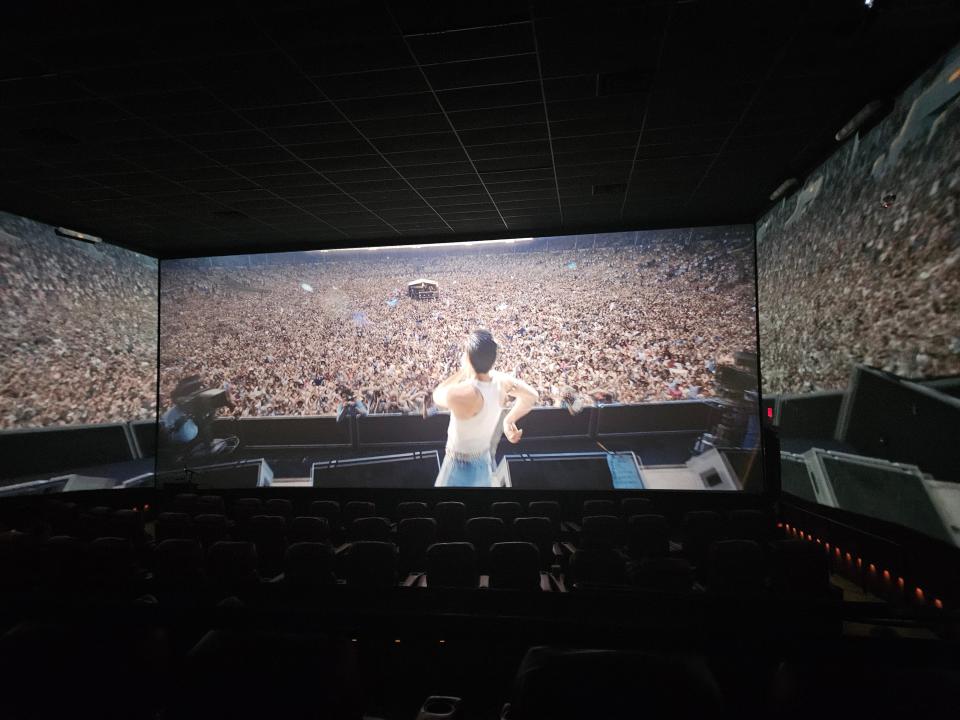 A scene from "Bohemian Rhapsody," the Oscar-winning movie adapted using the 270-degree ScreenX widescreen format, shown at Marcus Theatres' Ridge Cinema. The Ridge has Wisconsin's first ScreenX auditorium; for selected scenes the image wraps around the auditorium.