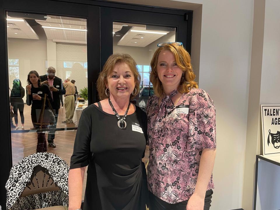 Actors Marsha O’Keefe and Amy Crowley volunteer to welcome attendees to the TN Actors Networking group mixer held at the Farragut Community Center Tuesday, March 29, 2022.