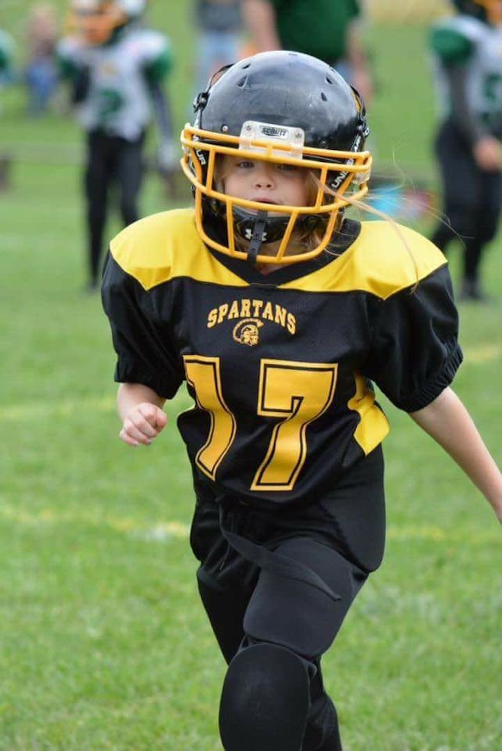 "My first-grader. The only girl on her Pop Warner team. She's my hero."