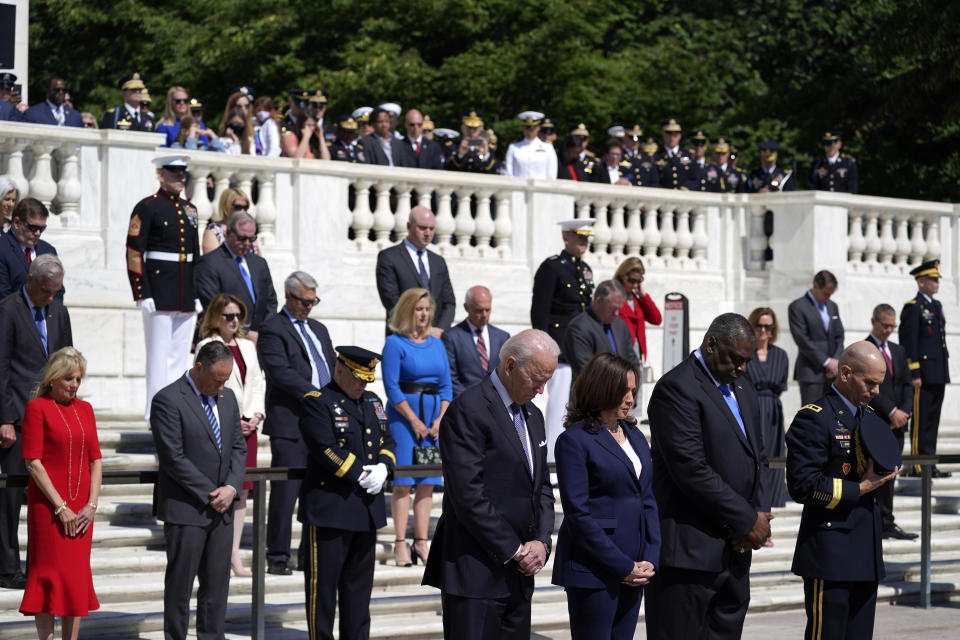 President Joe Biden, Vice President Kamala Harris, Defense Secretary Lloyd Austin and Maj. Gen. Omar J. Jones IV pause at the Tomb of the Unknown Soldier in Arlington National Cemetery on Memorial Day, Monday, May 31, 2021, in Arlington, Va.(AP Photo/Alex Brandon)