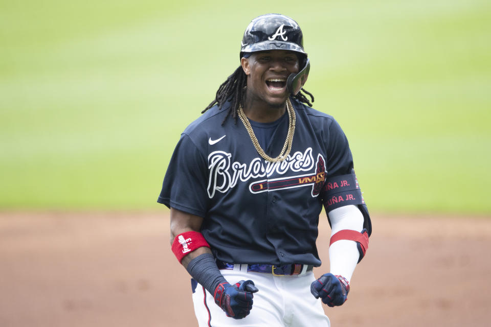 Atlanta Braves center fielder Ronald Acuna Jr. (13) reacts after popping out to second baseman Ozzie Albies during a practice baseball game, Thursday, July 9, 2020, in Atlanta. (AP Photo/John Bazemore)