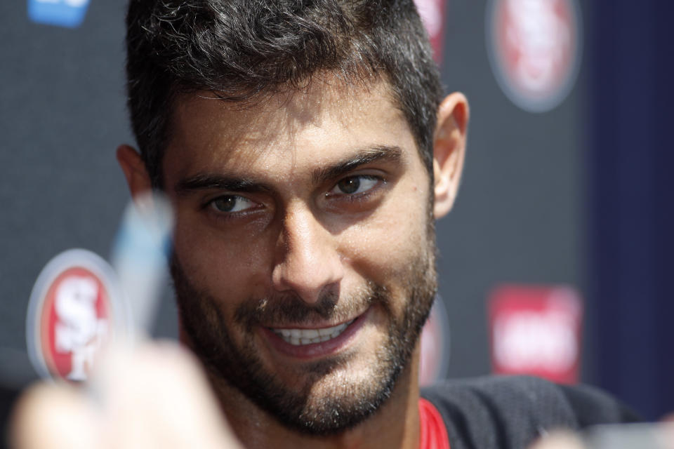 San Francisco 49ers quarterback Jimmy Garoppolo talks with reporters after a combined NFL football training camp with the Denver Broncos at the Broncos' headquarters Friday, Aug. 16, 2019, in Englewood, Colo. (AP Photo/David Zalubowski)