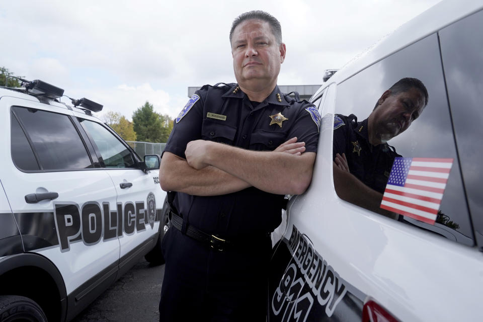 Kurt Whisenand, the deputy police chief in Rockford, Ill., poses for a portrait Monday, Sept. 20, 2021, in Rockford. Some teenagers in Rockford were arrested so many times that Whisenand knew them by name. But a report from a few years ago gave Whisenand the most pause, some of the offenders then 13 or 14 years old, had been sexually abused by the same man whom one of the boys had met on social media. (AP Photo/Charles Rex Arbogast)