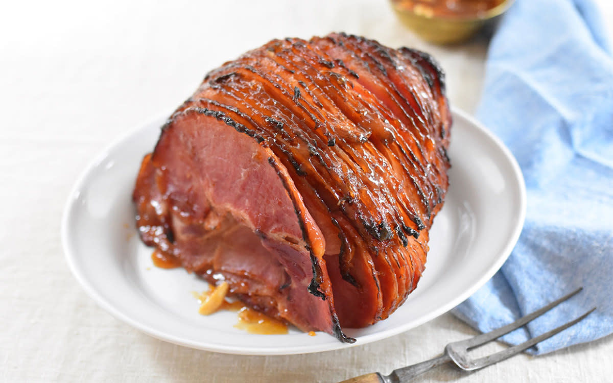 <p>Teresa Blackburn</p><p>Impress your family (or roommates) with a deliciously sweet apricot ham glaze. This fruity complement to baked ham has apricot preserves as a base and gets an extra zing from mustard and lemon juice.</p><p><strong>Get the recipe: <a href="/1017706/jocelynruggiero/apricot-ham-glaze/" data-ylk="slk:Apricot Ham Glaze;elm:context_link;itc:0;sec:content-canvas" class="link rapid-noclick-resp">Apricot Ham Glaze</a></strong></p>