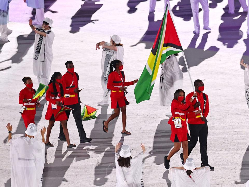 Athletes from Guyana make their entrance at the Summer Olympics.